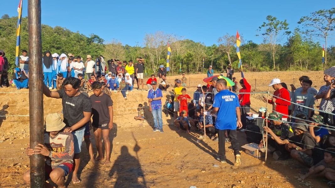 TMMD 125 Kodim 1417/Kendari Warnai Perayaan HUT RI ke-80 dengan Lomba Panjat Pinang
