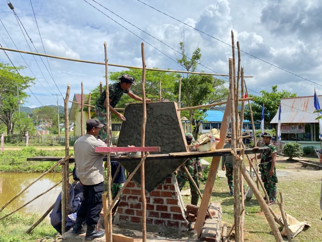 Sinergitas TNI-Polri Warnai Pembangunan Tugu TMMD 125 Kodim 1417/Kendari di Asinua
