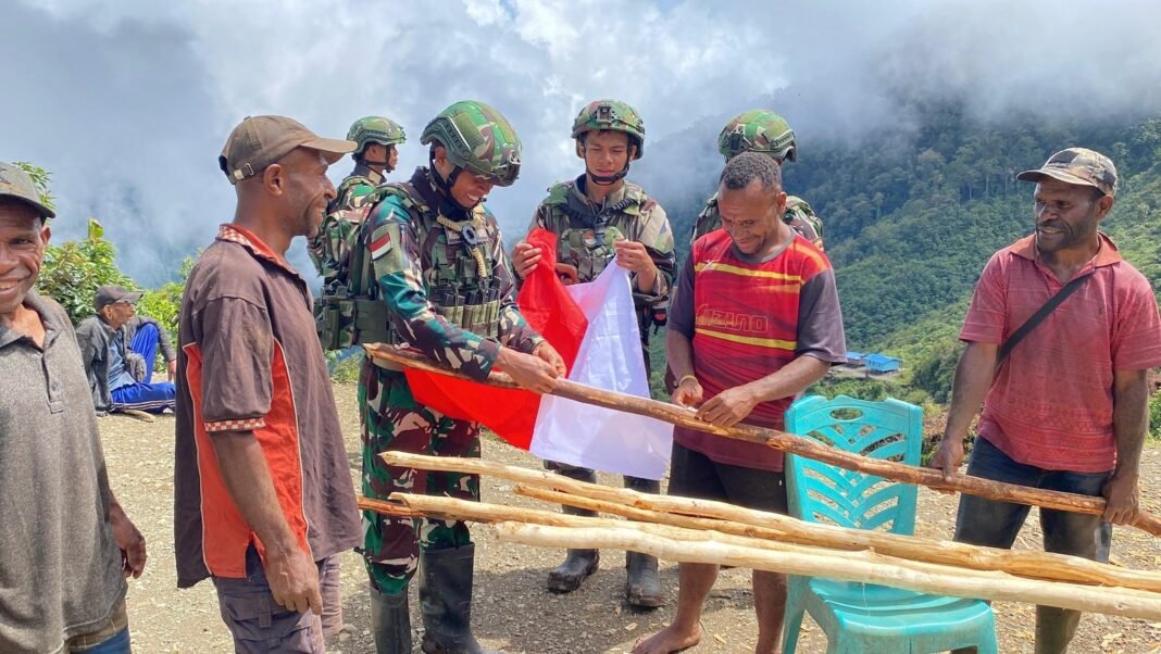 TNI dan Warga Tomka Rayakan HUT Ke-80 RI Dibalut Semangat Merah Putih
