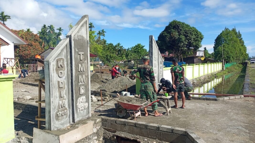 Gapura GKI Talitakum Hampir Rampung, Satgas TMMD 125 Nabire Genjot Finishing