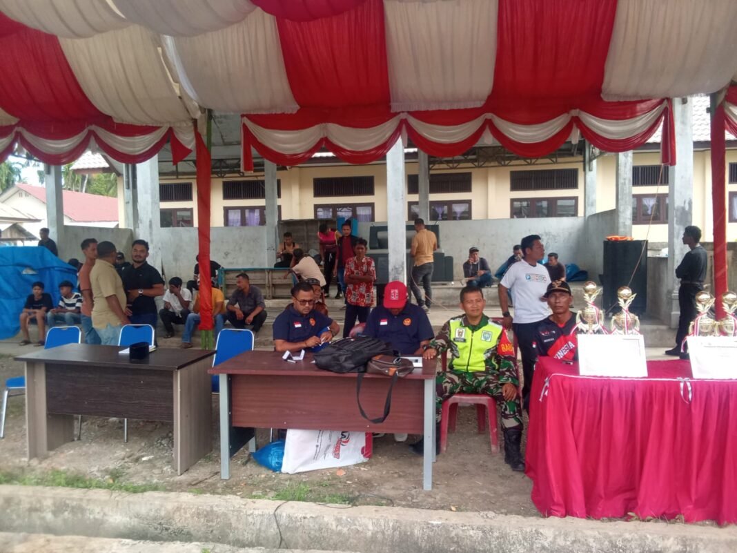 Olah Raga dan Semangat Kemerdekaan Babinsa Koramil 03 Kaway XVI Dampingi dan Sukseskan Turnamen Bola