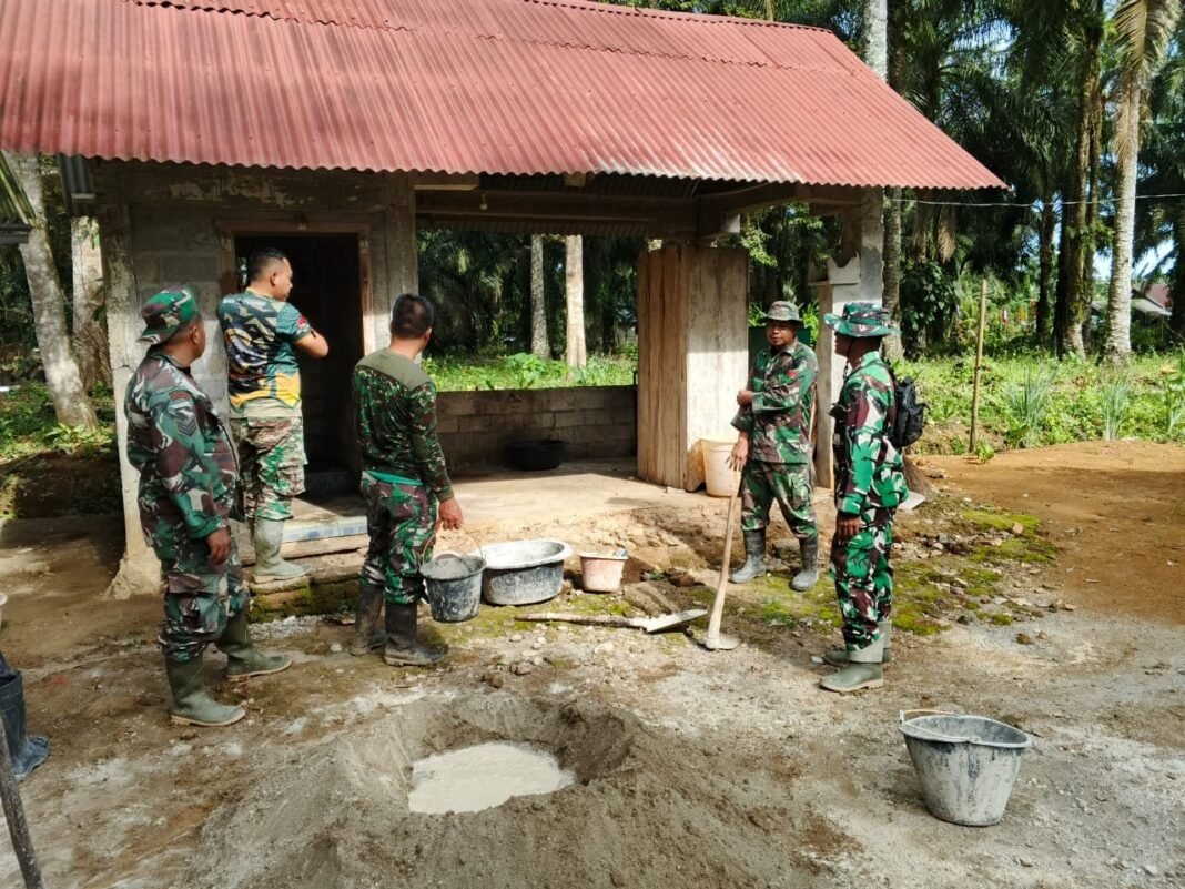 Gotong Royong Satgas TMMD dan Warga Wujudkan MCK Pura yang Layak dan Bersih