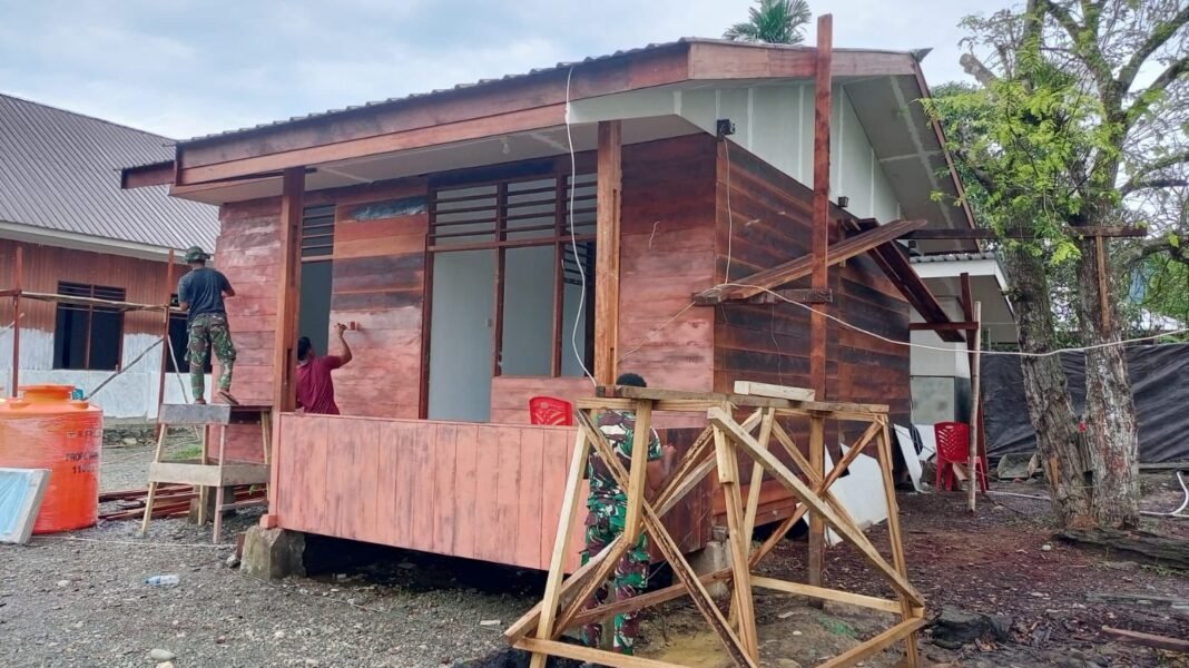 Rumah Pastori TMMD 125 Kodim 1705/Nabire Masuki Tahap Pengecatan
