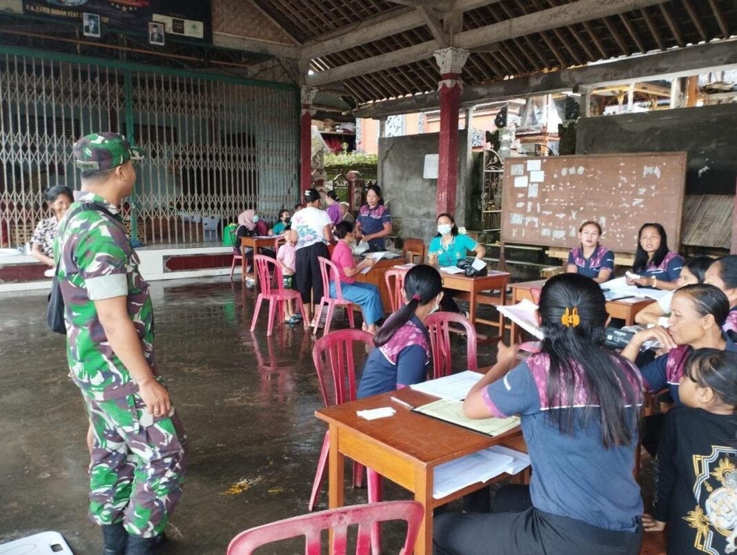 Babinsa Timuhun Dampingi Posyandu, Wujud Nyata Peran Aktif TNI Tingkatkan Kesehatan Masyarakat