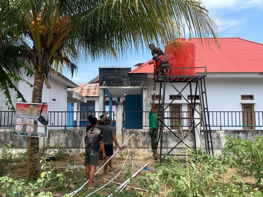 TMMD 126 Laksanakan Pemasangan Pipa Tandon di Sumur Bor untuk Penuhi Kebutuhan Air Warga