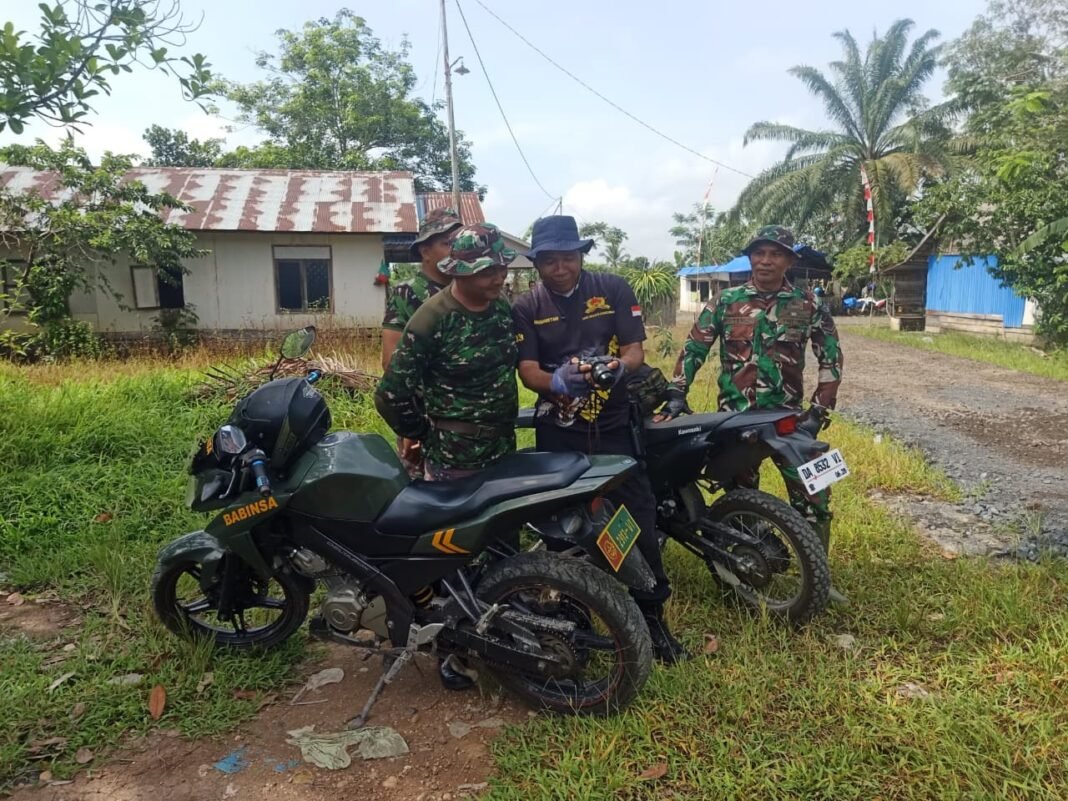 Saksi Kegiatan TMMD, Sertu Abriansyah Tak Pernah Lepas Kamera