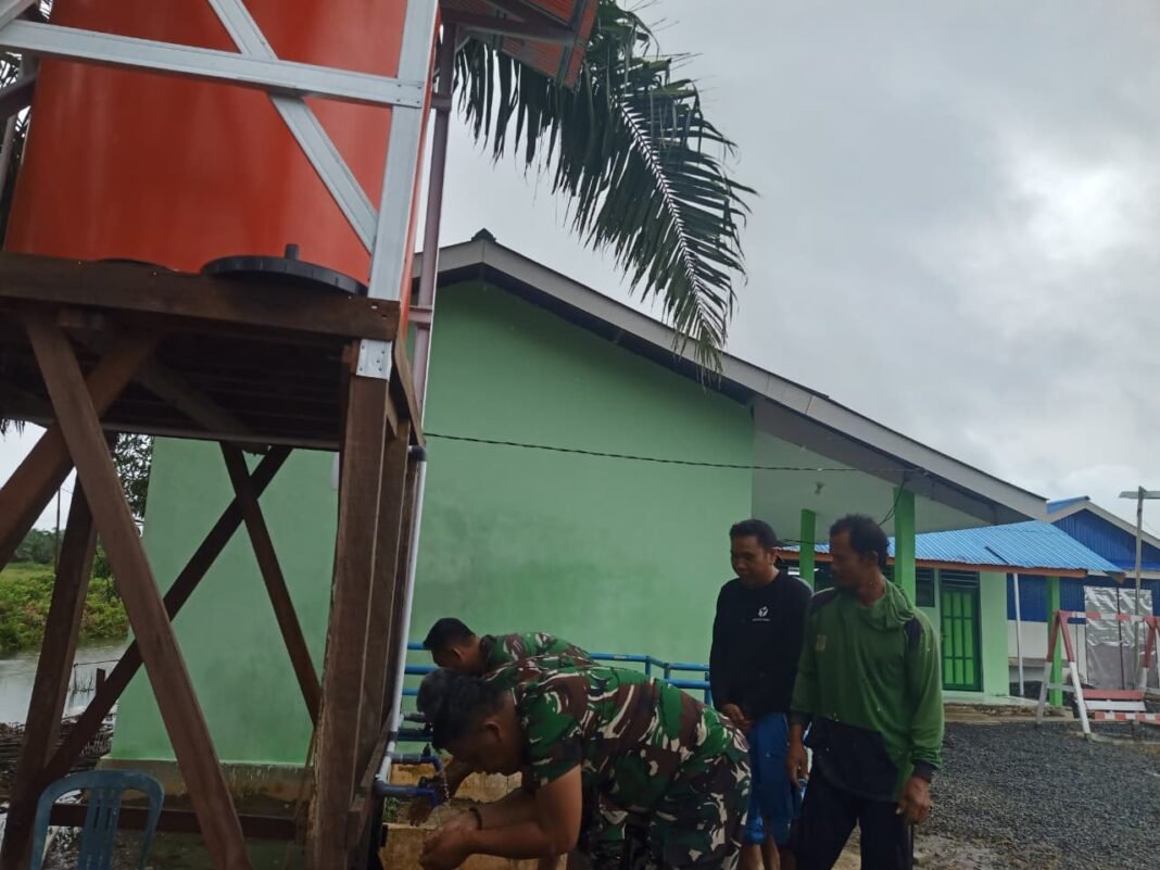 Program TMAB TNI Mulai Ringankan Beban Warga Tumih dalam Kebutuhan Air