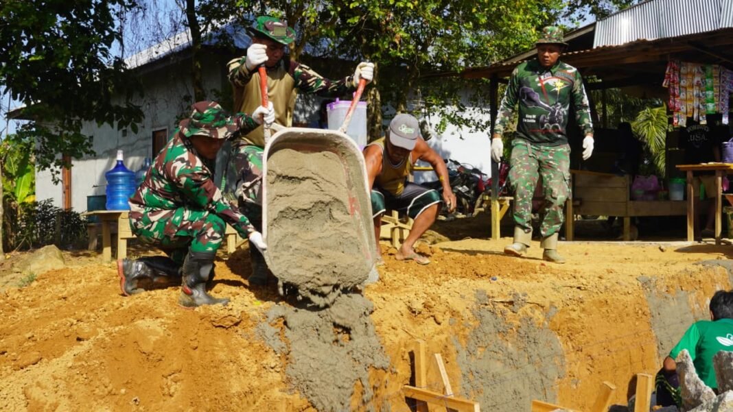 Arco Jadi Andalan Satgas TMMD Kodim 1015/Sampit untuk Pembangunan Siring Jalan