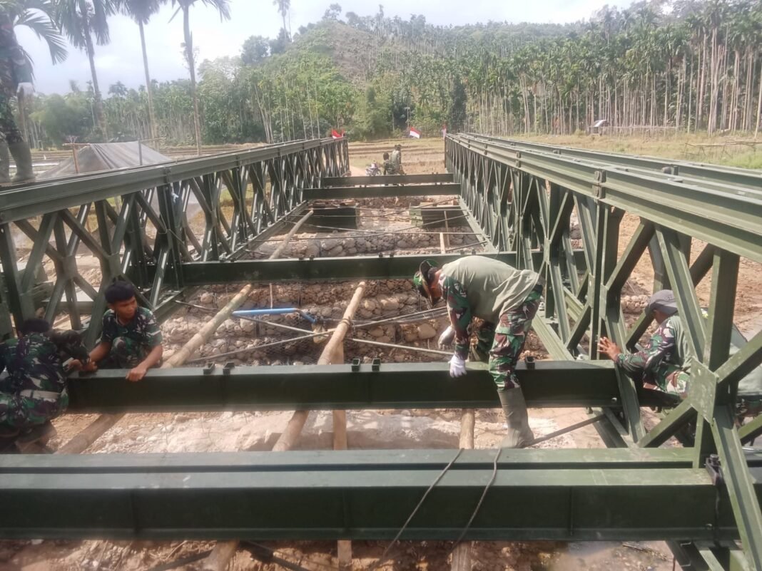 TNI Teruskan Pengecatan TK Negeri Pembina Langkahan Pasca Banjir