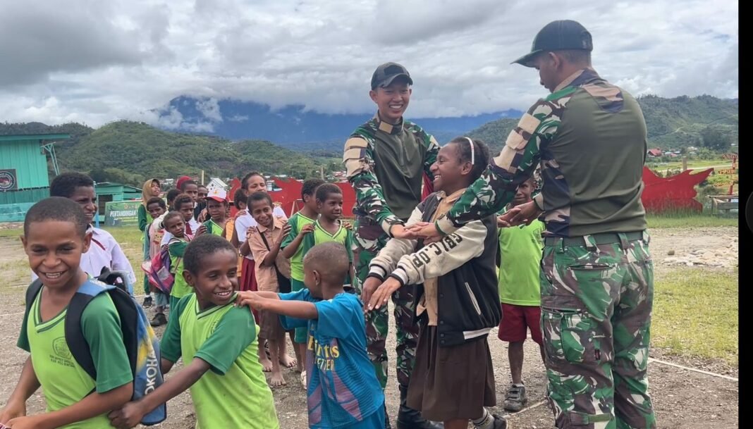Makan Gratis bagi Anak Pedalaman: Satgas Yonif 751/VJS Ciptakan Kebahagiaan di RM Swasembada