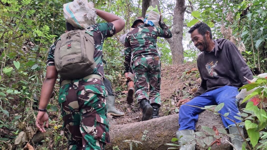 Kebersamaan dan Keceriaan Warnai Gotong Royong Satgas TMMD 127 di Sambuli