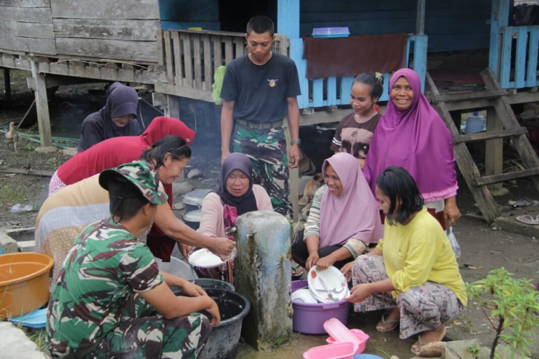 Kehadiran Satgas TMMD ke-127 Perkuat Hubungan Sosial di Dusun Ogomolobu