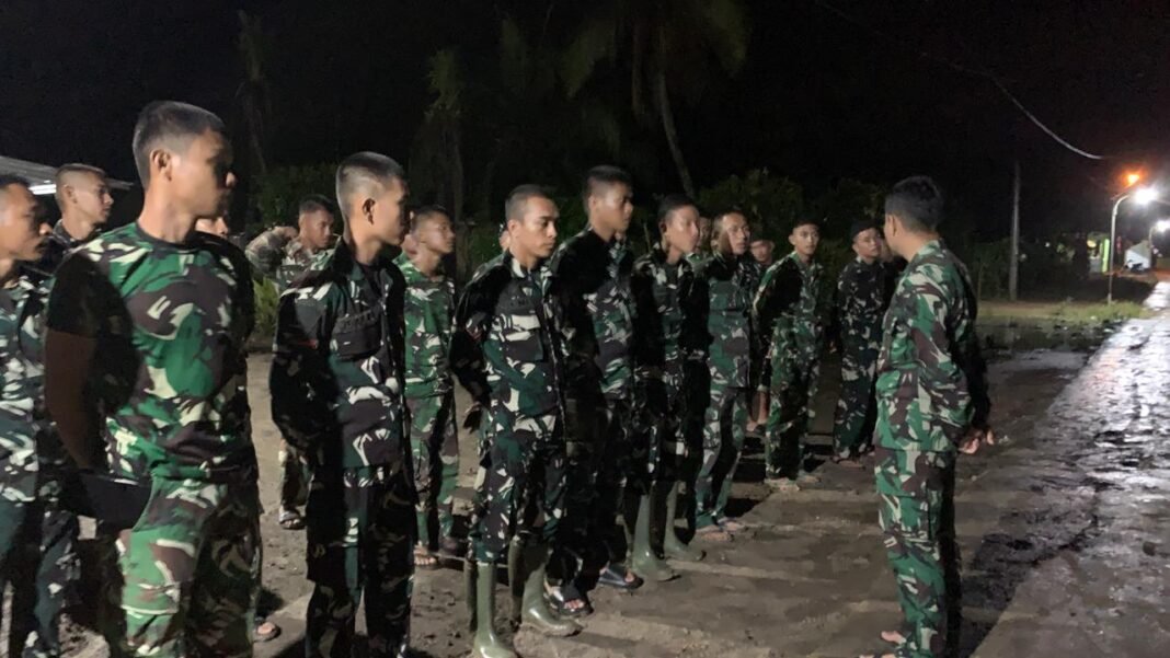 Satgas TMMD Gelar Apel Malam untuk Memastikan Kesiapsiagaan Personel