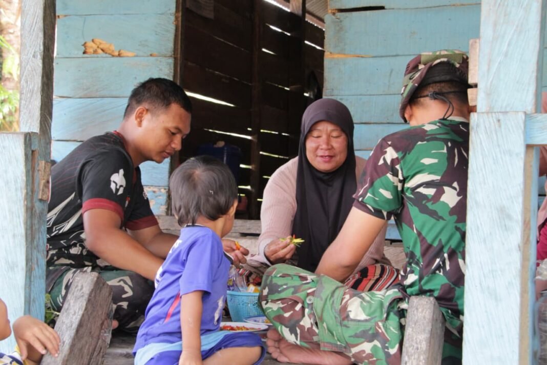 Kehangatan Kerja Sama Satgas TMMD ke-127 Bersama Warga Dusun Ogomolobu