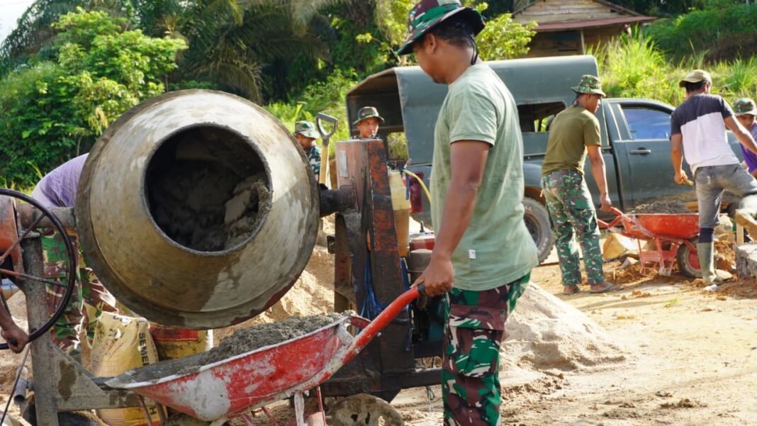 Mesin Molen Percepat Proses Pembangunan Siring Jalan di TMMD 127