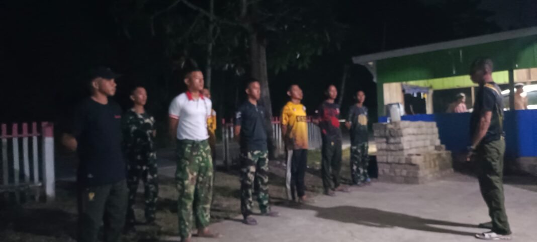 Evaluasi Progres TMMD ke-127 Melalui Apel Malam di Kelurahan Sambuli