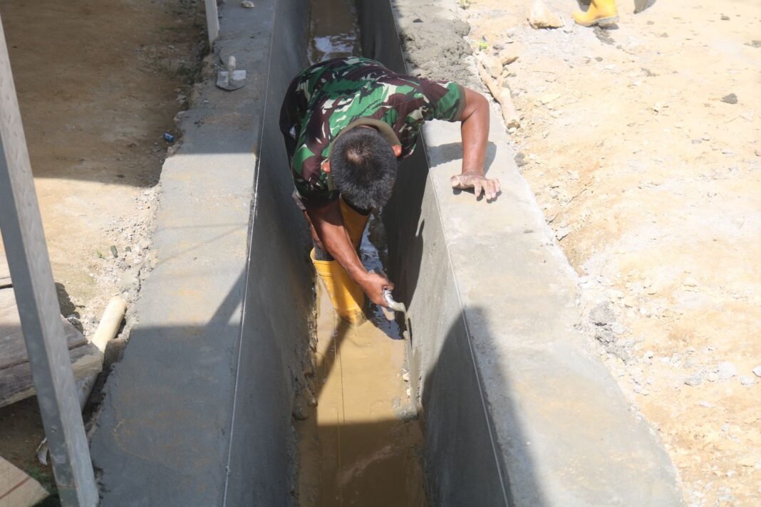 Satgas TMMD Ke-127 Kodim 1417/Kendari Percepat Pembangunan Drainase di Anggoeya