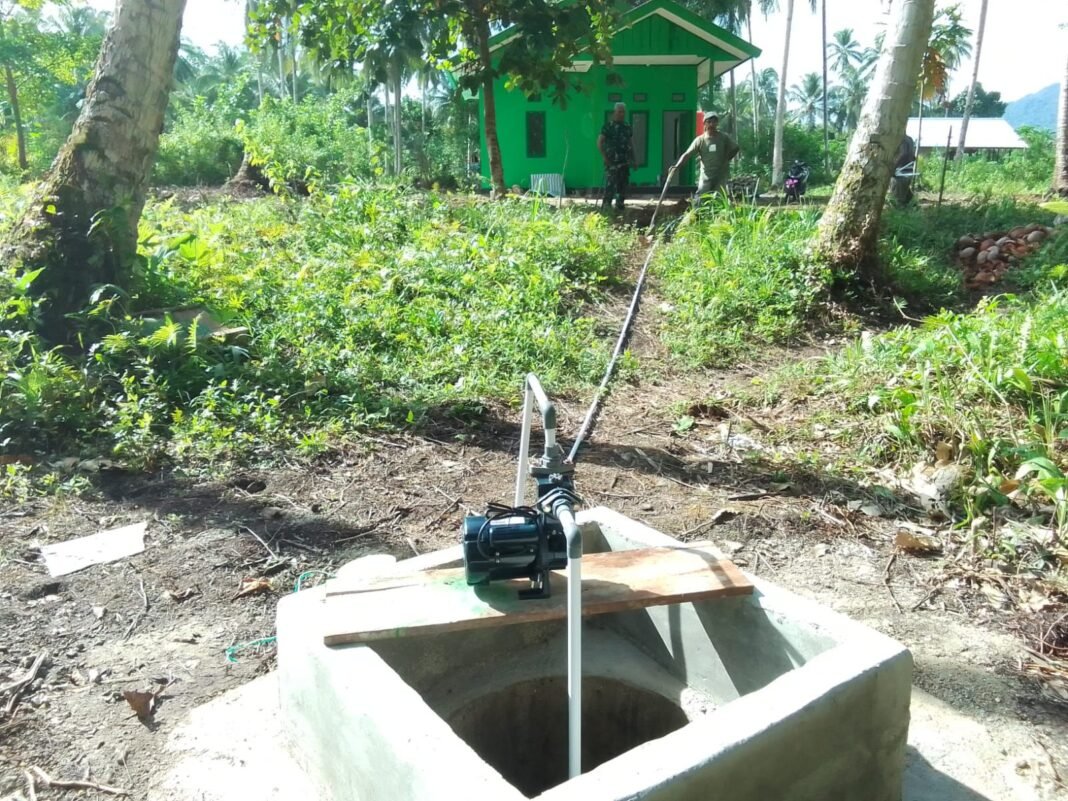 Pemasangan Mesin Air di Sumur TMMD 127 Kampung Sisir Rampung