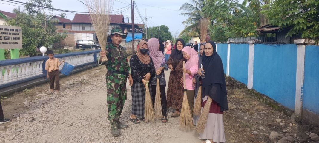 Sinergi TNI dan Warga Desa Passeno Melalui Karya Bakti Bersama