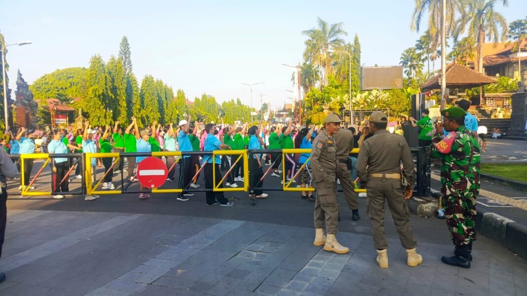 Dandim Klungkung Turunkan Babinsa untuk Amankan Jalan Sehat Selaras Gizi Berkualitas