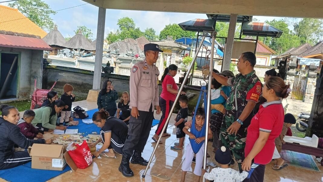 Babinsa Desa Landih Berperan Dalam Kegiatan Posyandu Terpadu