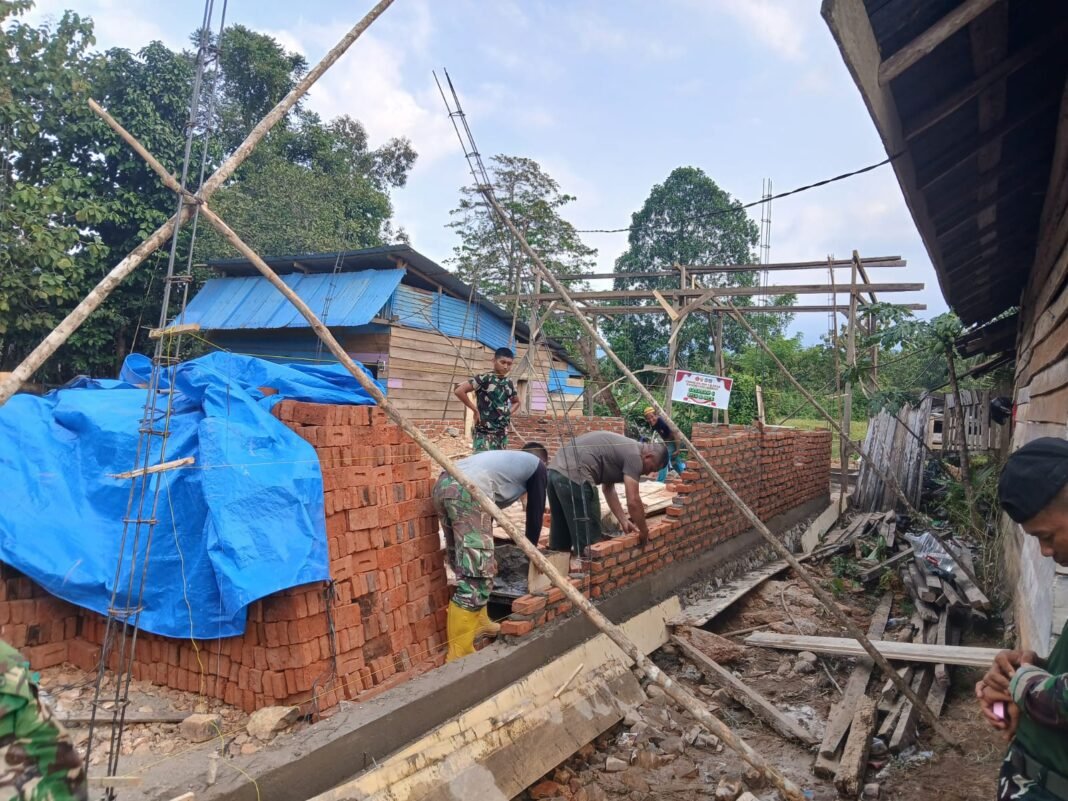 Kebersamaan Warga Amolame dalam Program TMMD ke-128