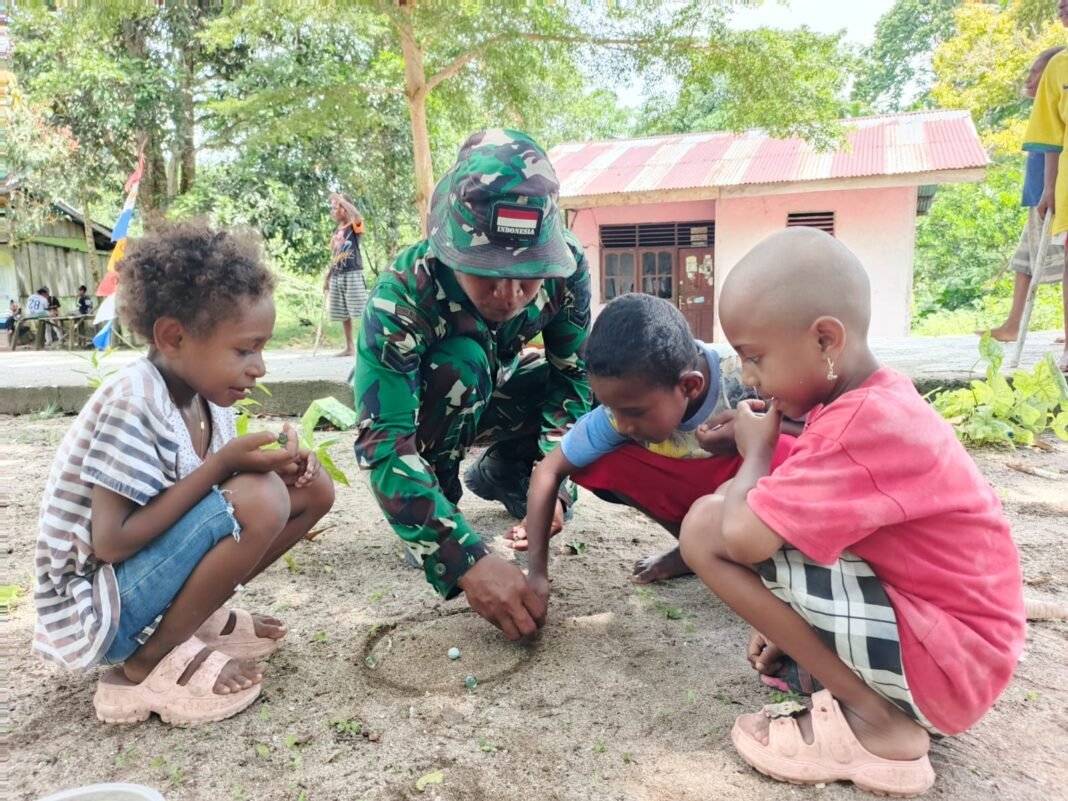 Keceriaan di TMMD Ke-128: Sertu Celvin dan Anak-Anak