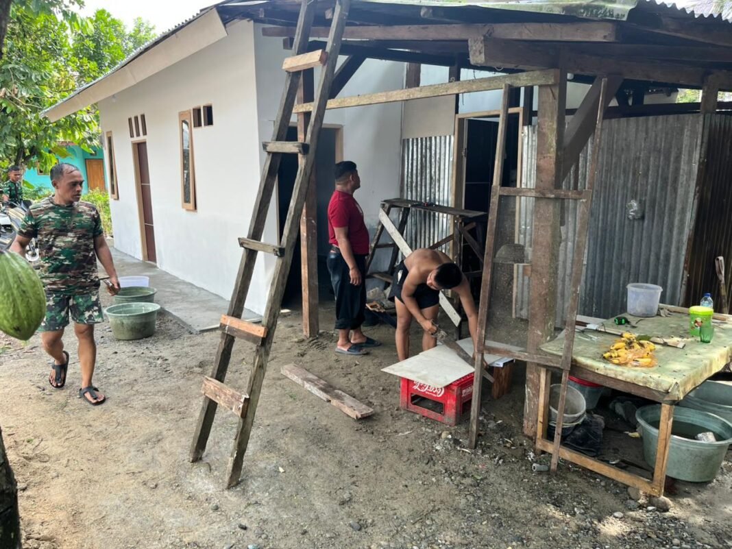 Partisipasi Satgas TMMD Kodim 1306/KP dalam Rehabilitasi RTLH