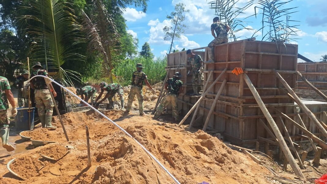 Kerja Keras TNI Brigif TP 32/Mangkalihat dalam Proyek Jembatan Garuda