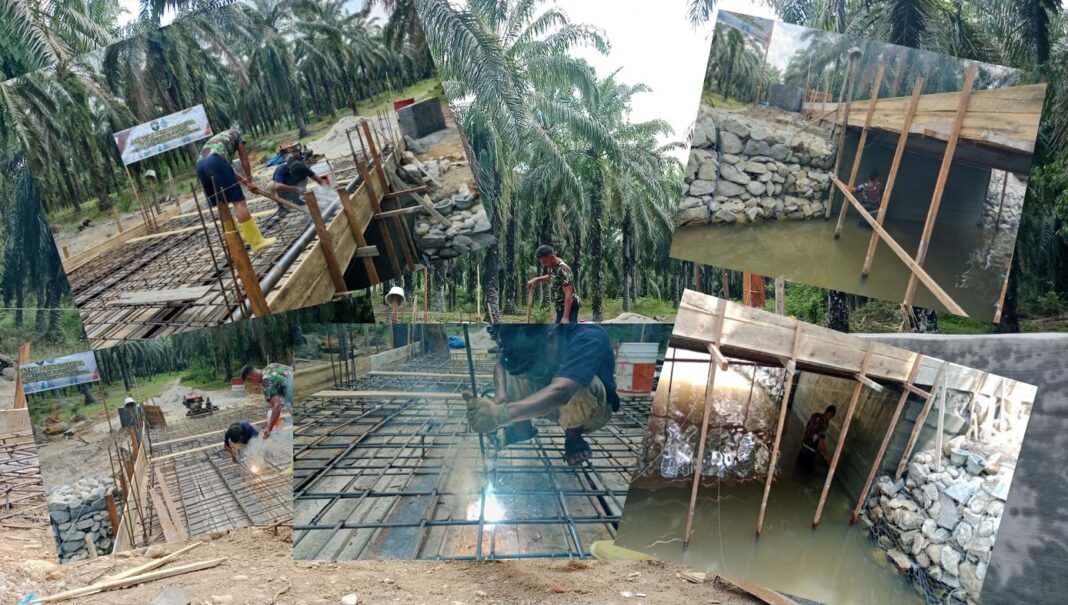 Pengelasan Gelagar dan Plester Abutmen Jembatan Garuda Terus Digenjot TNI