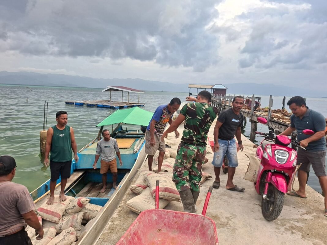 Sinergi Masyarakat dan Satgas Dalam Pembangunan TMMD 129