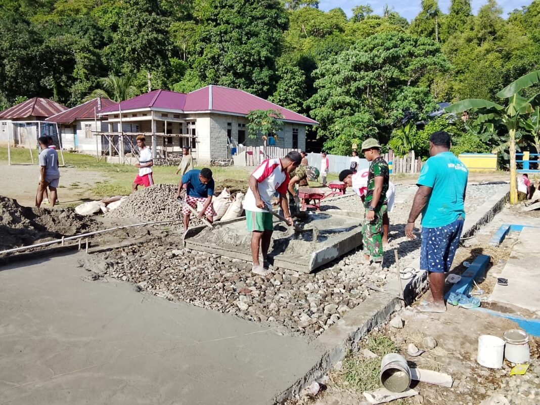 Dukungan TNI dalam Pembangunan Jalan Desa Yeisowo
