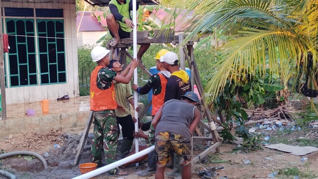 Pemasangan Pipa oleh Satgas TMMD Ke-129 di Kalteng