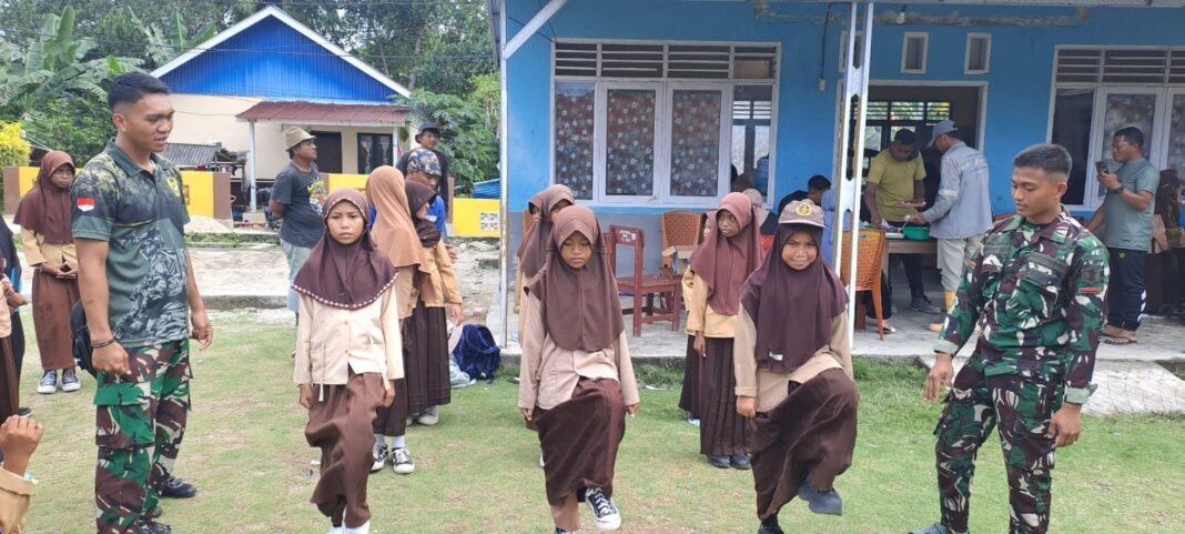 Satgas TMMD Berikan Pembinaan Karakter Lewat Pelatihan PBB di SDN Umbele