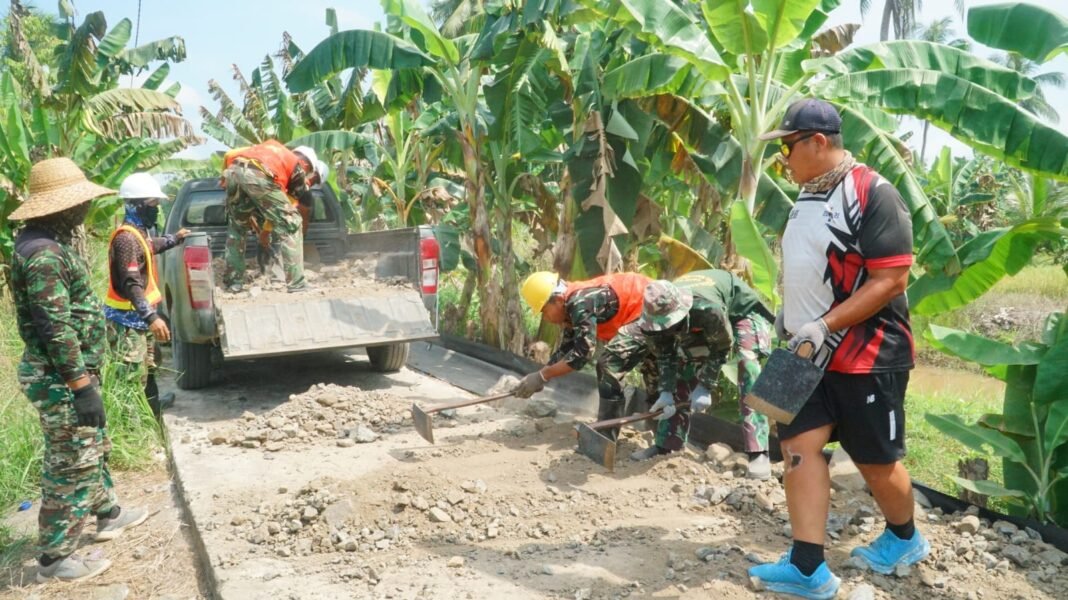 Kolaborasi Efektif Satgas TMMD dan Warga dalam Pembangunan Jalan Bandaraya