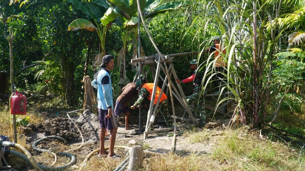 Kolaborasi yang Kuat antara Satgas TMMD dan Komunitas dalam Proyek Sumur Bor di Desa Bandar Raya