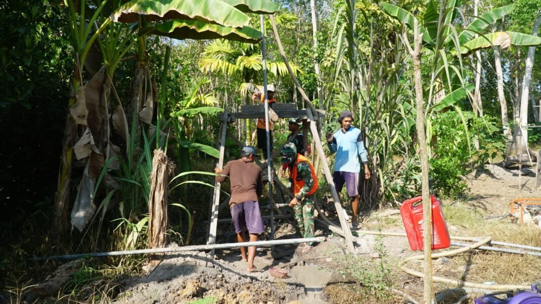 Sumur Bor Program TMMD Ke-129 untuk Meningkatkan Kesehatan Desa Bandar Raya