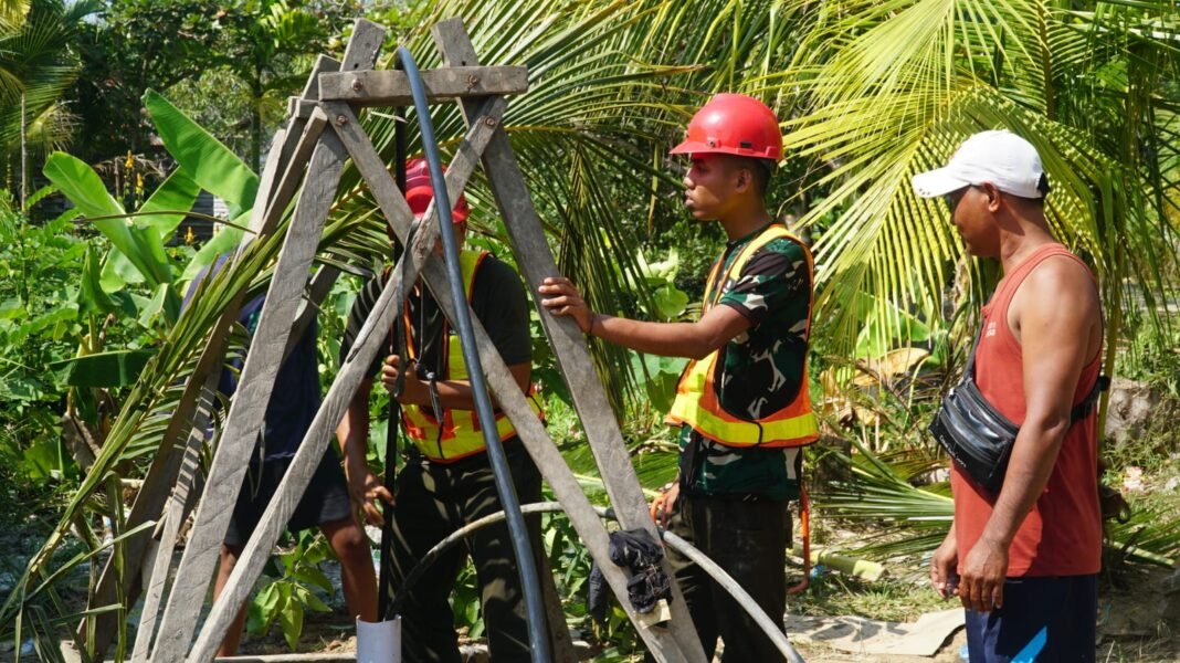 Kerjasama Satgas TMMD dengan Warga dalam Penyediaan Air Bersih
