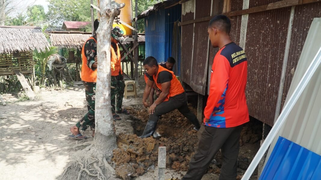 Gotong Royong dalam TMMD: Pembangunan MCK Ibu Siti Jahrah oleh TNI dan Warga