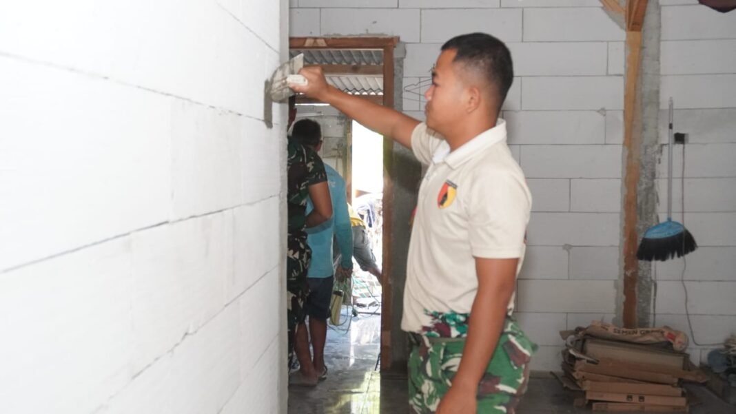 Citarasa Profesional dalam Renovasi Dinding oleh Satgas TMMD ke-129 di Tlemang
