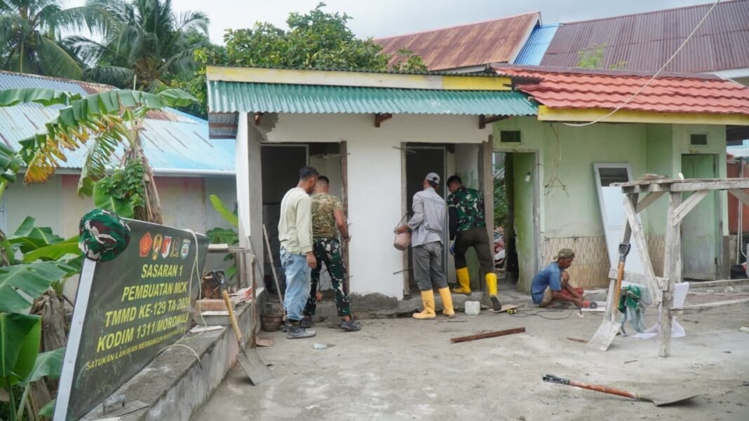 Satgas TMMD Ke-129 Tingkatkan Proyek Pembangunan MCK di Desa Umbele