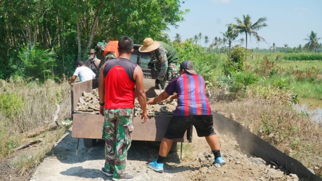 TMMD Reguler Ke-129 Membangun Jalan di Desa Bandar Raya