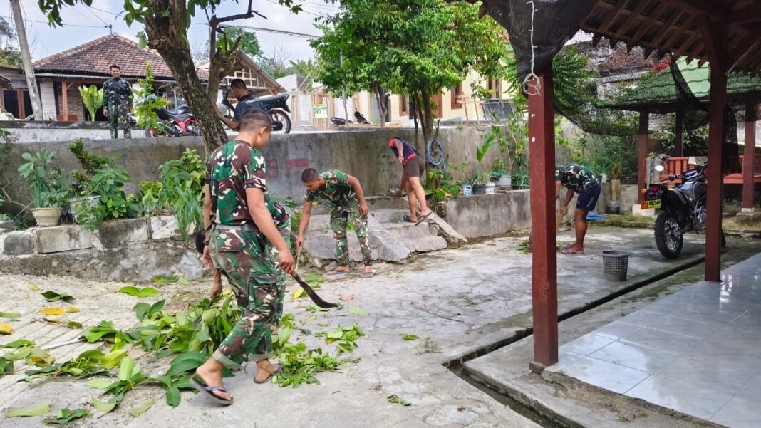 Satgas TMMD Ke-129 Mengajak Warga Peduli Kebersihan