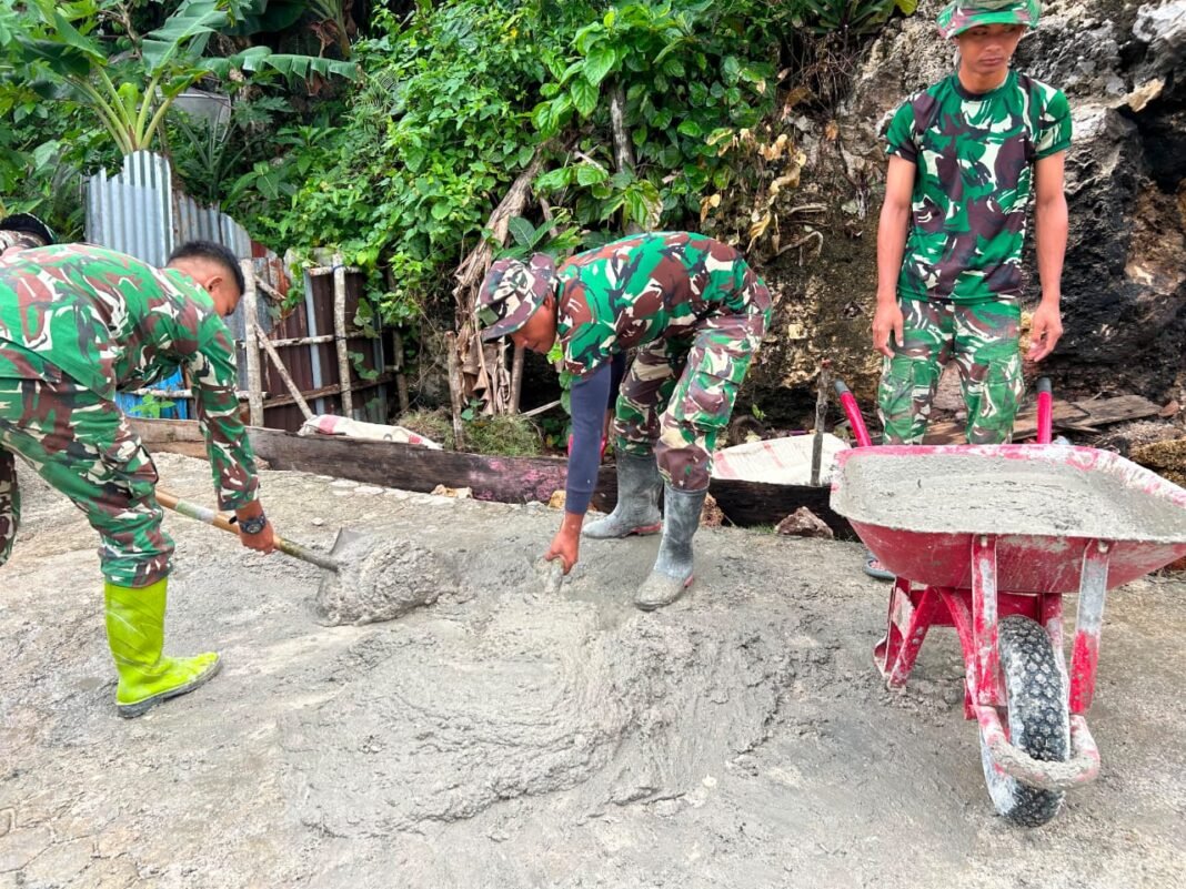 Gotong Royong Warga dalam Proyek Pembangunan Rabat Jalan