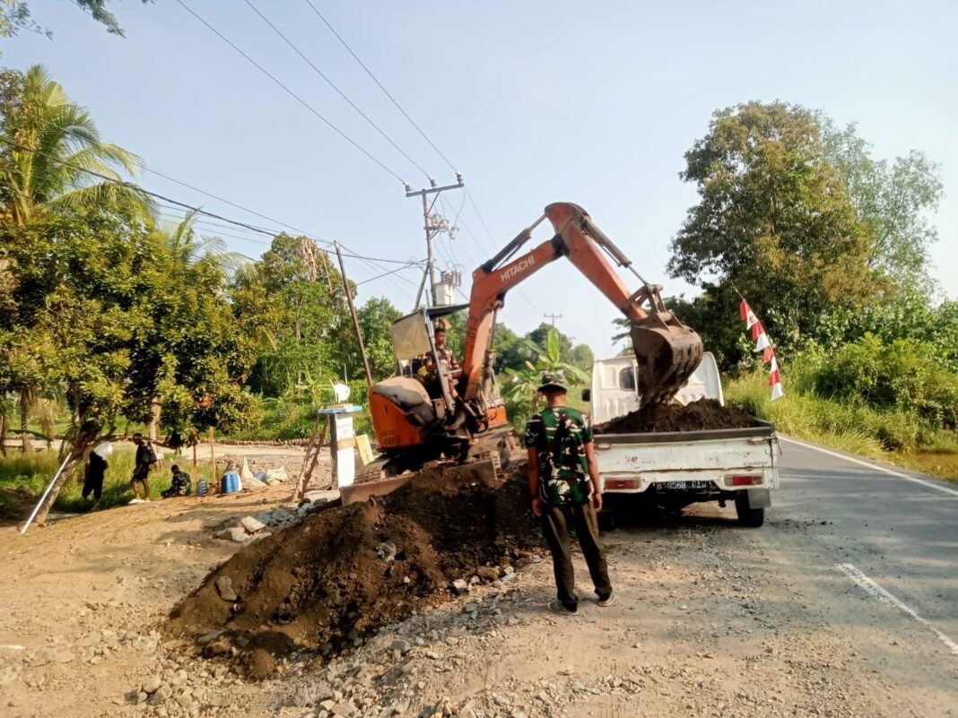 Percepatan Pembangunan Jalan oleh Satgas TMMD Reguler ke-129