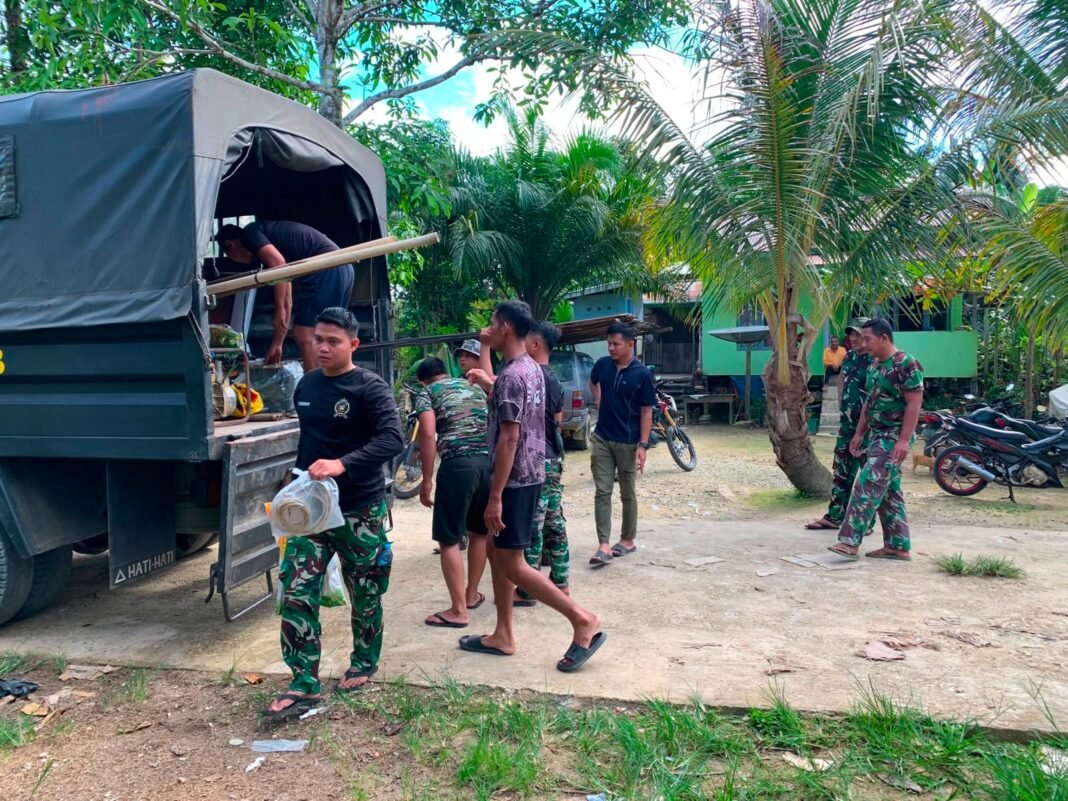 TNI dan Komunitas Warga Bersinergi dalam TMMD di Belatung