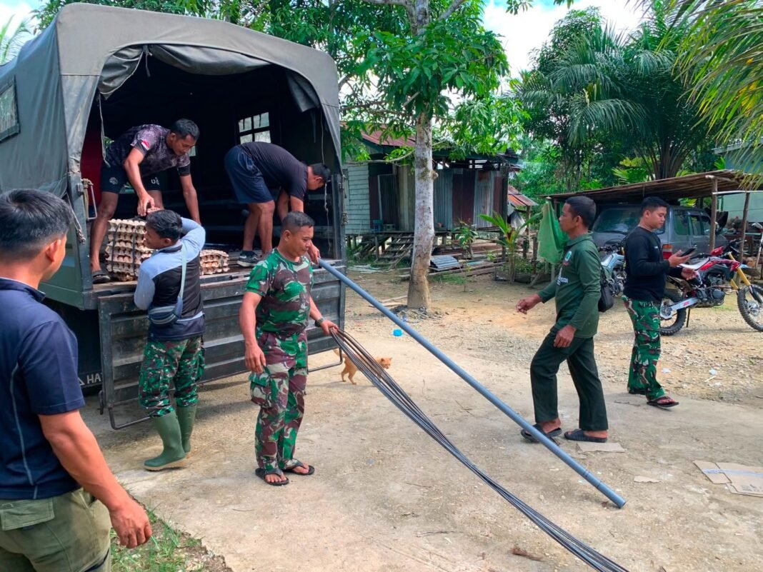 Kolaborasi TNI dan Warga Dalam Pembangunan di Desa Belatung