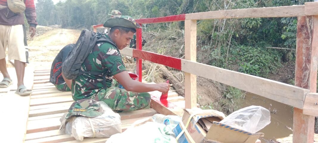 Jembatan Sempurna: Satgas TMMD Selesaikan Pengecatan Pagar