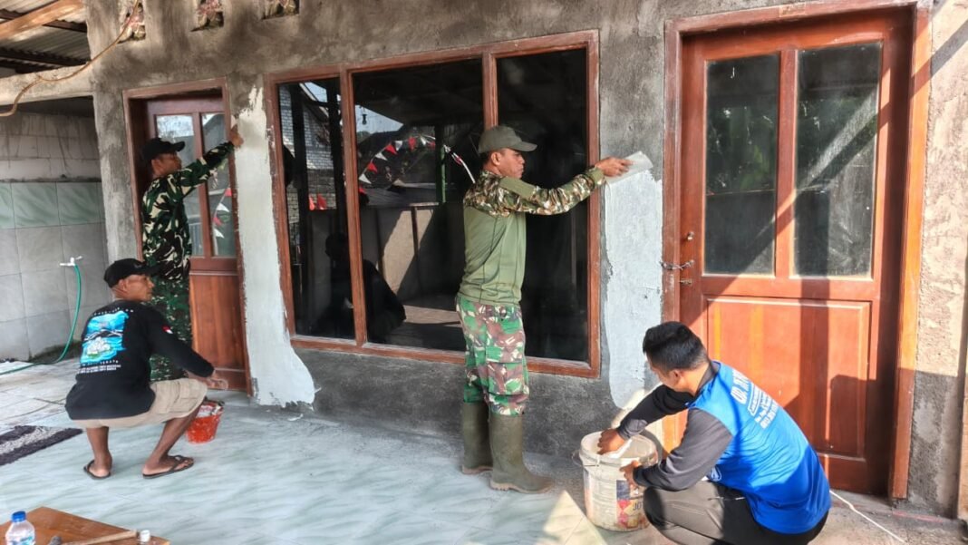 Satgas TMMD 129 dan Warga Bersinergi Memperindah Mushola di Desa Tlemang