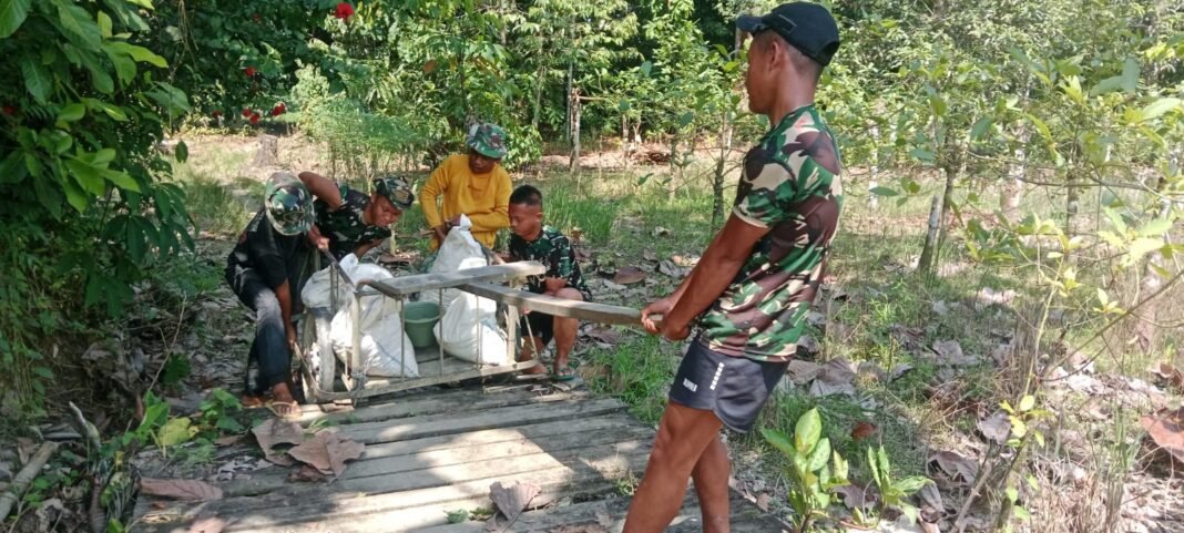 Semangat Satgas TMMD Ke-129 Membangun Bersama Masyarakat
